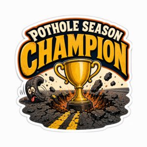 Edmonton pothole sticker showing a gold trophy rising out of a cracked asphalt pothole
